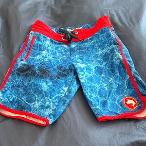 Pelagic Boys Fishing Board Shorts in Blue and Red with adjustable waist